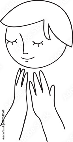 A young woman gently rests her hands on her face displaying a serene expression.