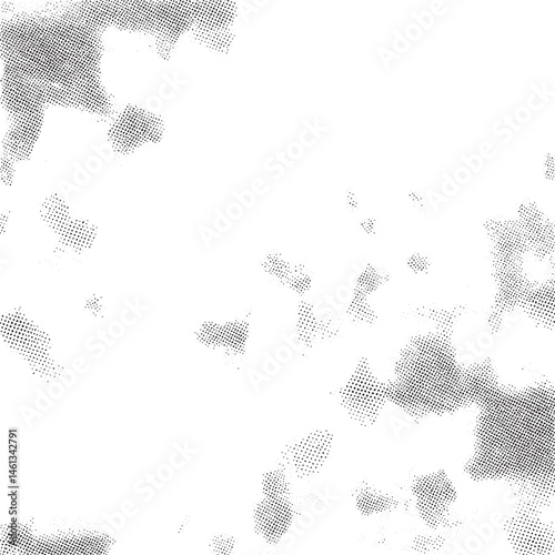 A textured white background showcases numerous small dark dots scattered across the surface.
