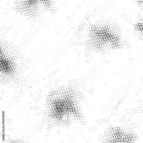 Dense of scattered black and white dots creates an abstract texture.