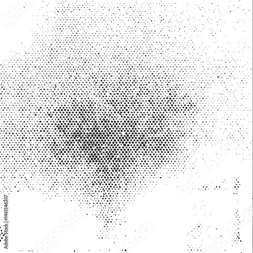 A dense of small white dots covers a blurred gray area.