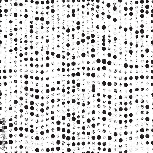 A dense grid of black and white dots creates a textured