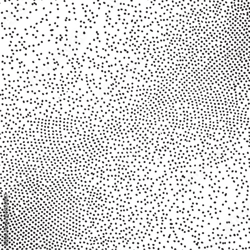 A dense of small dark dots gradually transitions to a lighter background.