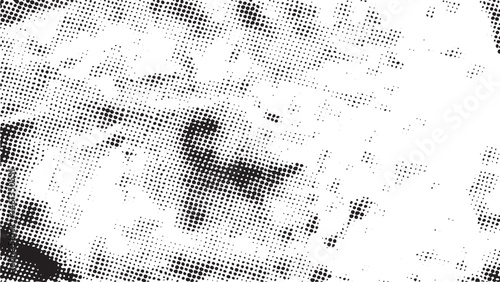 A black and white abstract with scattered dots.