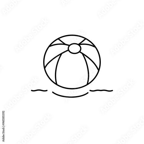 Beach ball floating on water