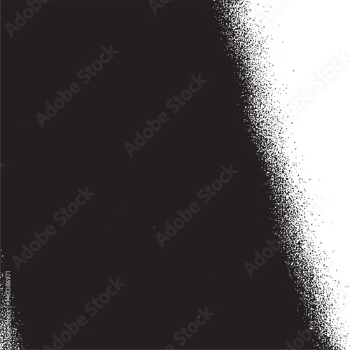 A stark black and white contrast sharply divides a smooth textured surface.