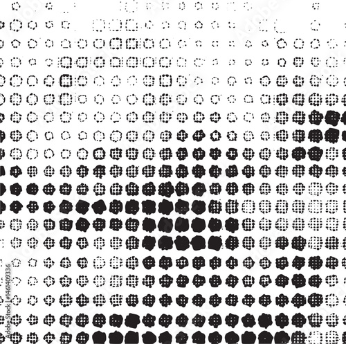 A dense arrangement of numerous black and white circular shapes creates an intricate