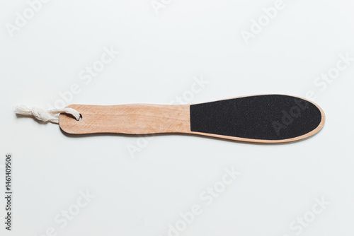 Obraz na płótnie Wooden Heel scraper for foot peeling on white. Top view. w salonie