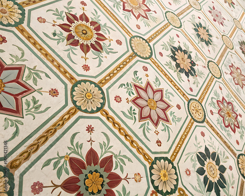 Close‑up of ornate medallion tile featuring interlocking circles and floral rosettes
Primer plano de un azulejo con medallón ornamentado que presenta círculos entrelazados y rosetones florales