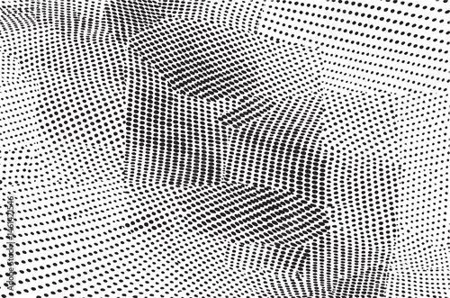 A grayscale face emerges from a dense field of small overlapping dots.