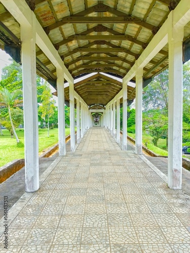 Covered Walkway Perspective with Architectural Columns and Tiled Floor