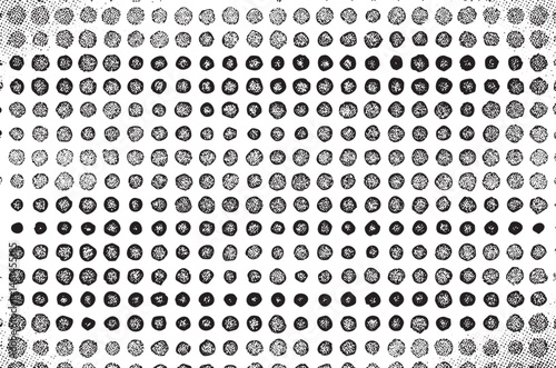 A dense array of black and white circular dots creates a mesmerizing