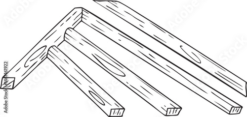 Three wooden planks lean against a wall creating a simple structure.