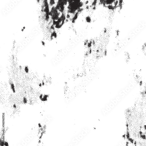 A textured speckled white background with dark spots.