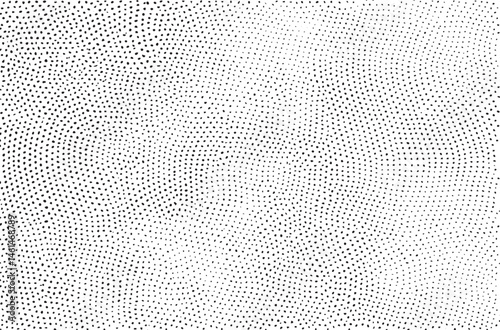 A dense repeating of black dots against a white background.
