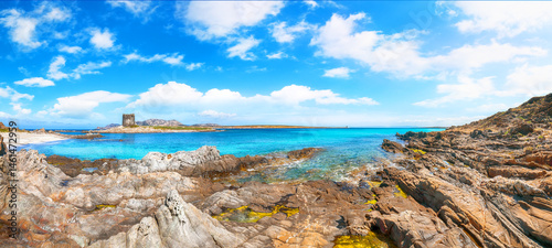 Obraz na płótnie Unbelivable morning view of famous La Pelosa beach and rocky shore near Torre della Pelosa w salonie