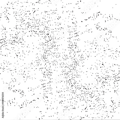 A dense scattering of small dark dots covers a predominantly white background.