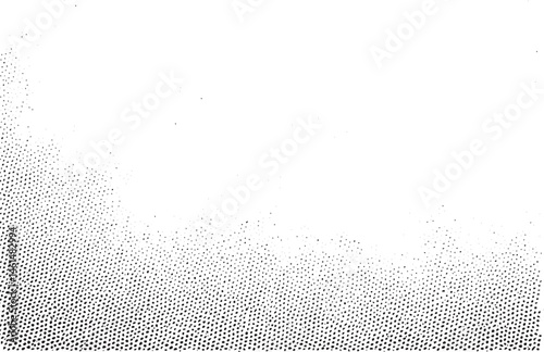 A dense collection of small dark dots gradually transitions into a lighter tone across a white background.