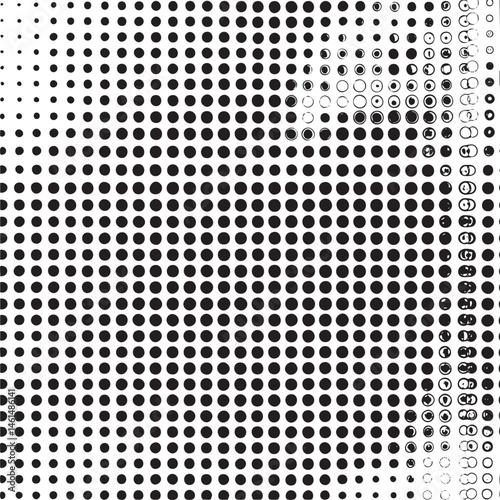 A dense of black and white circles creates a dynamic visual texture.