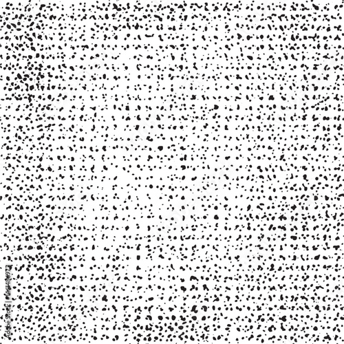 A seamless black and white gradient texture with scattered dots.