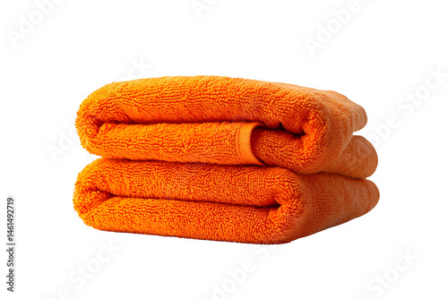 Folded, vibrant orange towel, soft texture, stacked neatly