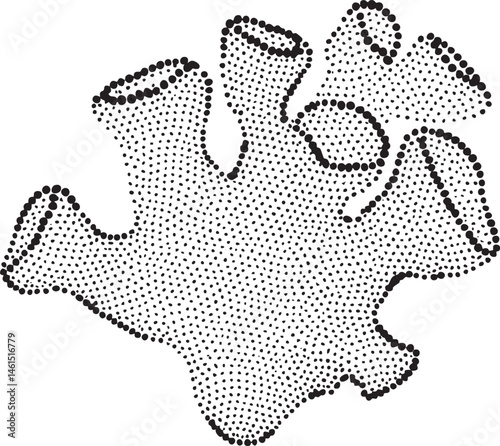 A black and white jigsaw puzzle piece rests on a smooth surface.