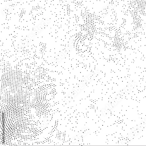 A textured grayscale abstract of closely spaced dots.