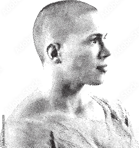 A young man gazes thoughtfully upwards with a focused expression.