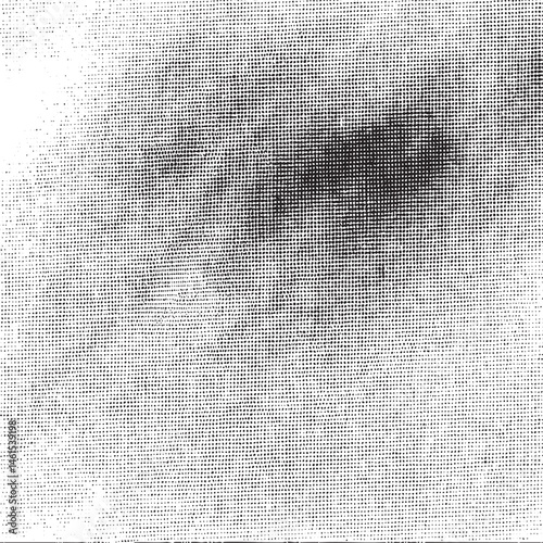 A grayscale portrait features a blurred human eye with a dark shadow obscuring part of the iris.