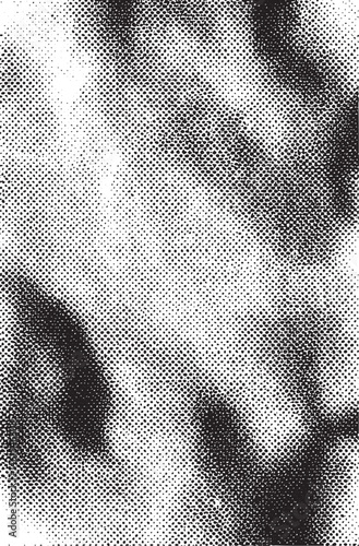 A textured monochrome portrait reveals a blurred human face.