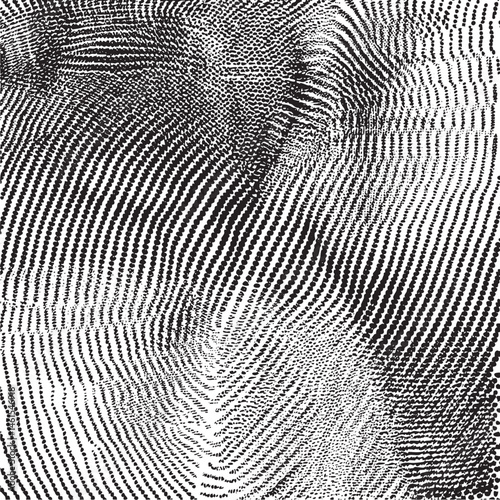 A close-up of a face reveals intricate swirling black and white lines.