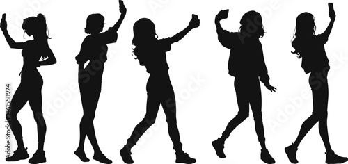 Silhouette of a woman taking a selfie with her smartphone, capturing modern digital culture and self-expression.