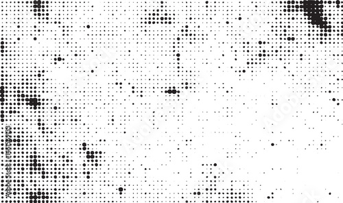 A grayscale abstract background composed of numerous small scattered dots.