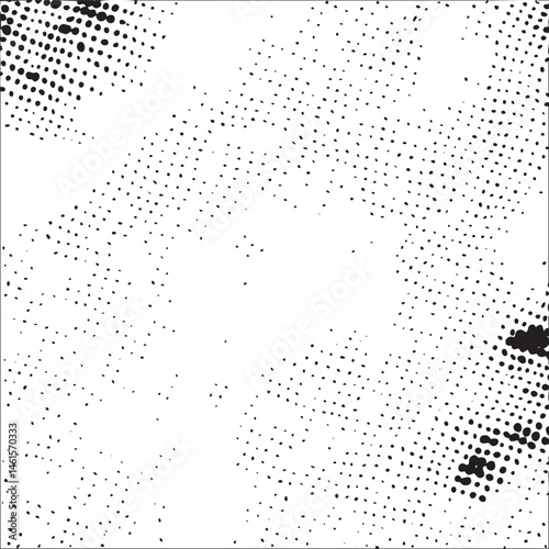 A dense scattering of small dark dots covers a predominantly white surface.