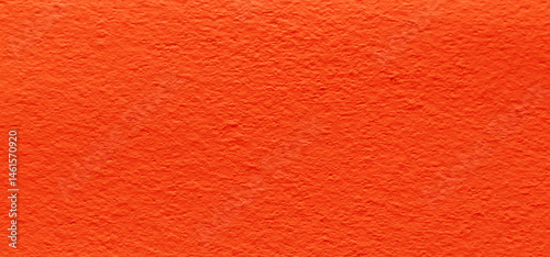 Surface of abstract concrete cement texture in autumn leaves color. Color of orange concrete wall background.
