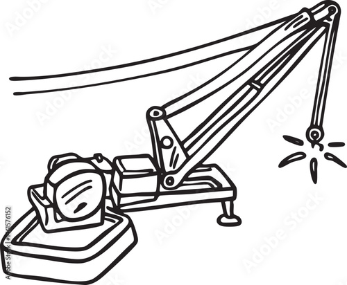 A black and white crane gently lifts a small rectangular block.