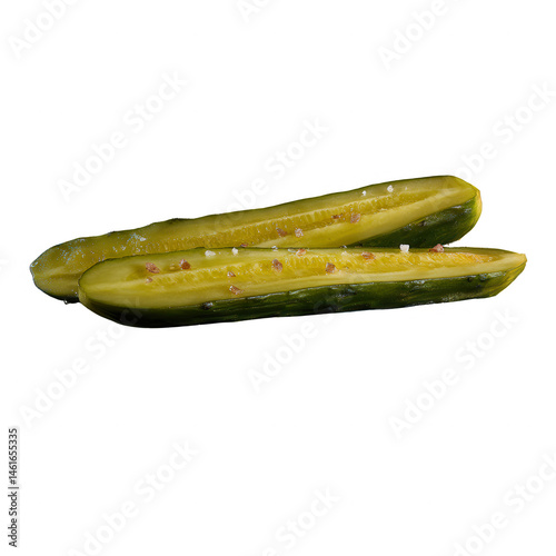 Two sliced pickles arranged side by side, showcasing their vibrant green color and sprinkled with coarse salt, perfect for garnish or side dishes.