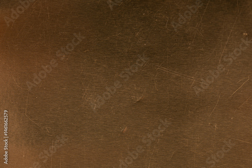 Obraz na płótnie High-resolution photo of a scratched brown metal surface. Perfect for backgrounds and textures. w salonie