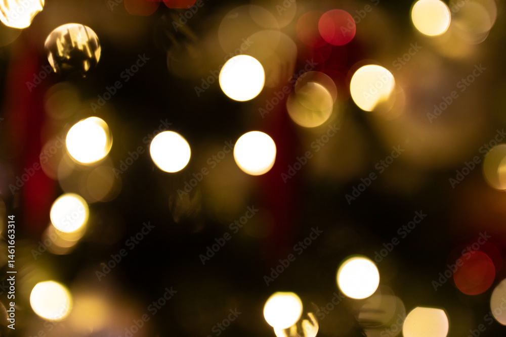 Beautiful bokeh background of warm golden Christmas lights, perfect for festive designs.