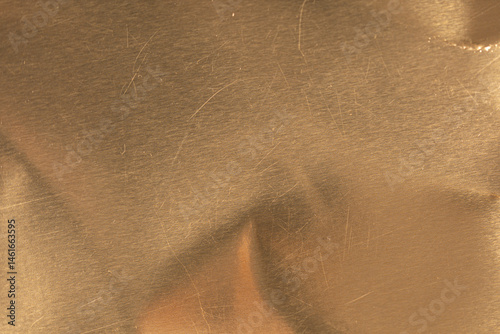 Obraz na płótnie High-resolution image of a scratched gold metal texture. Perfect for backgrounds and design projects. w salonie