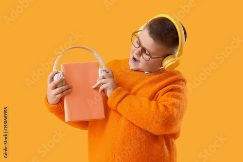 Little boy with headphones ...