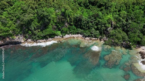 Wallpaper Mural Stunning aerial of turquoise waves breaking over rugged rocks Torontodigital.ca