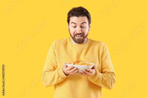 Man with tasty nachos on ye...