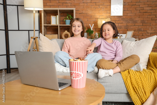 Cute girls watching cartoon...
