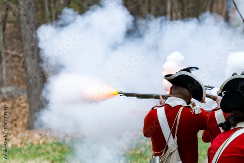 Revolutionary War British Soldier Firing Musket photo