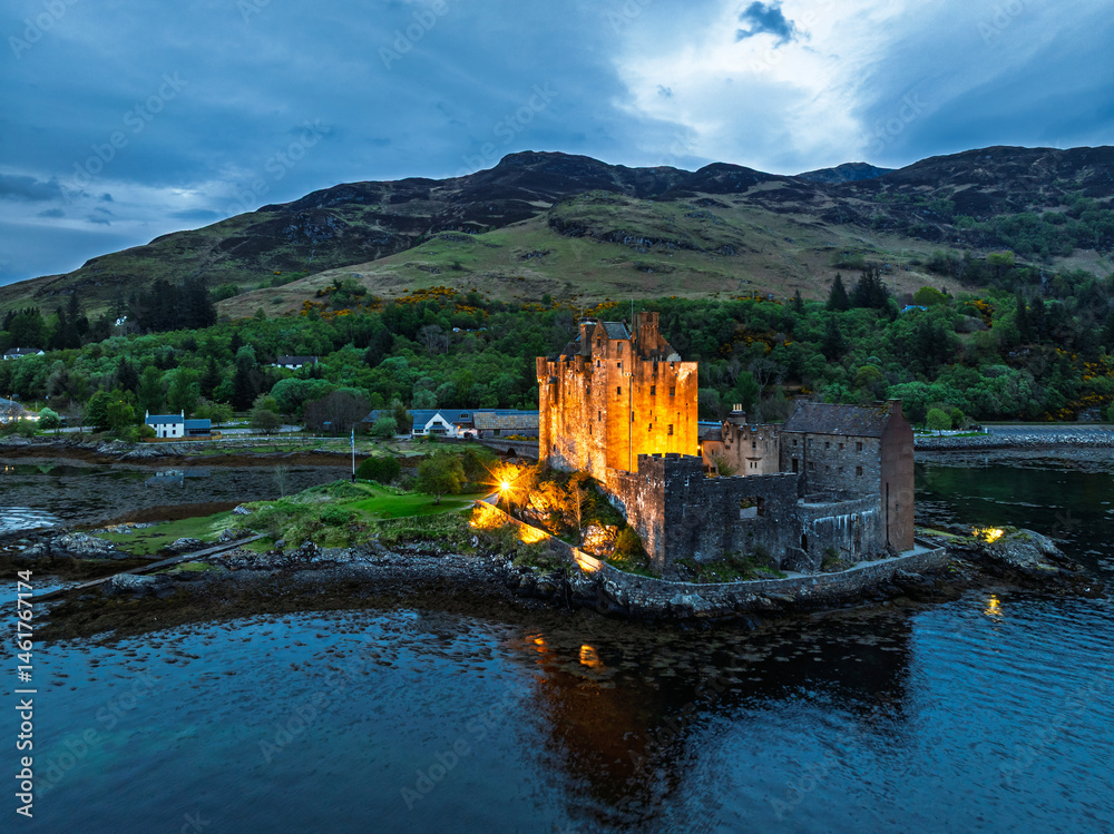 Night over Eilean Donan Castle and Loch Duich from a drone, Isle of Skye, Highlands, Scotland, England
