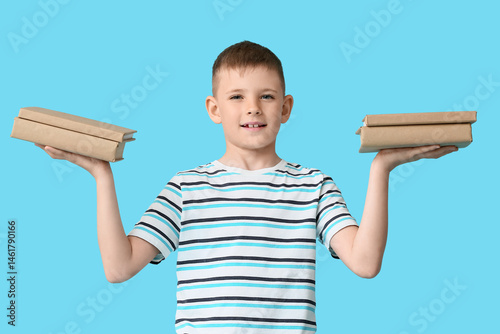 Cute little boy holding boo...