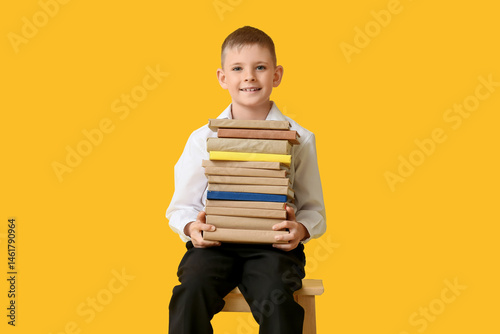 Cute little boy with stack ...