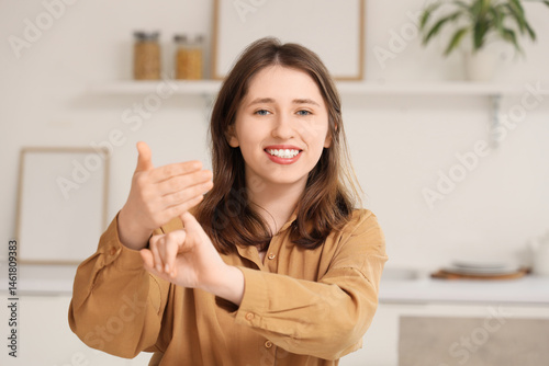 Young mute woman using sign...
