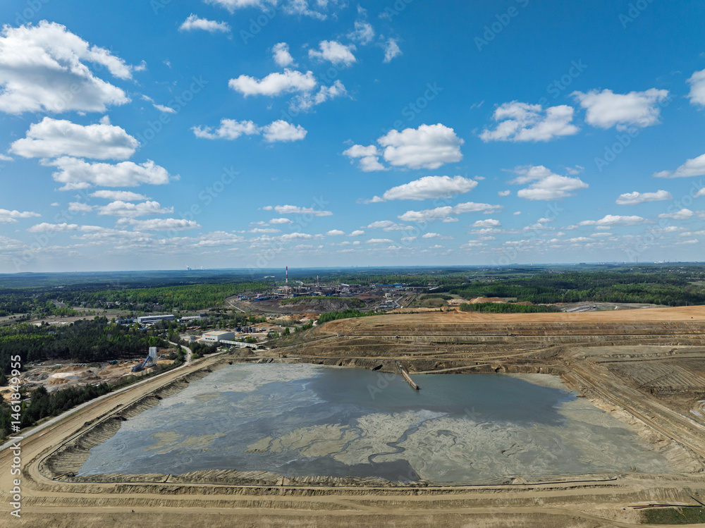 Industrial coal mine, abstract sendimentation tank of mine in Poland. Industrial lake Aerial drone photo view. Settling tanks and clarifiers are on wastewater treatment plant