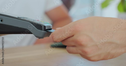 Wallpaper Mural Credit card machine for money transaction. Man hand with credit card swipe through pos terminal and enter pin code. Banking services of electronic money. Financial success and safety. Torontodigital.ca